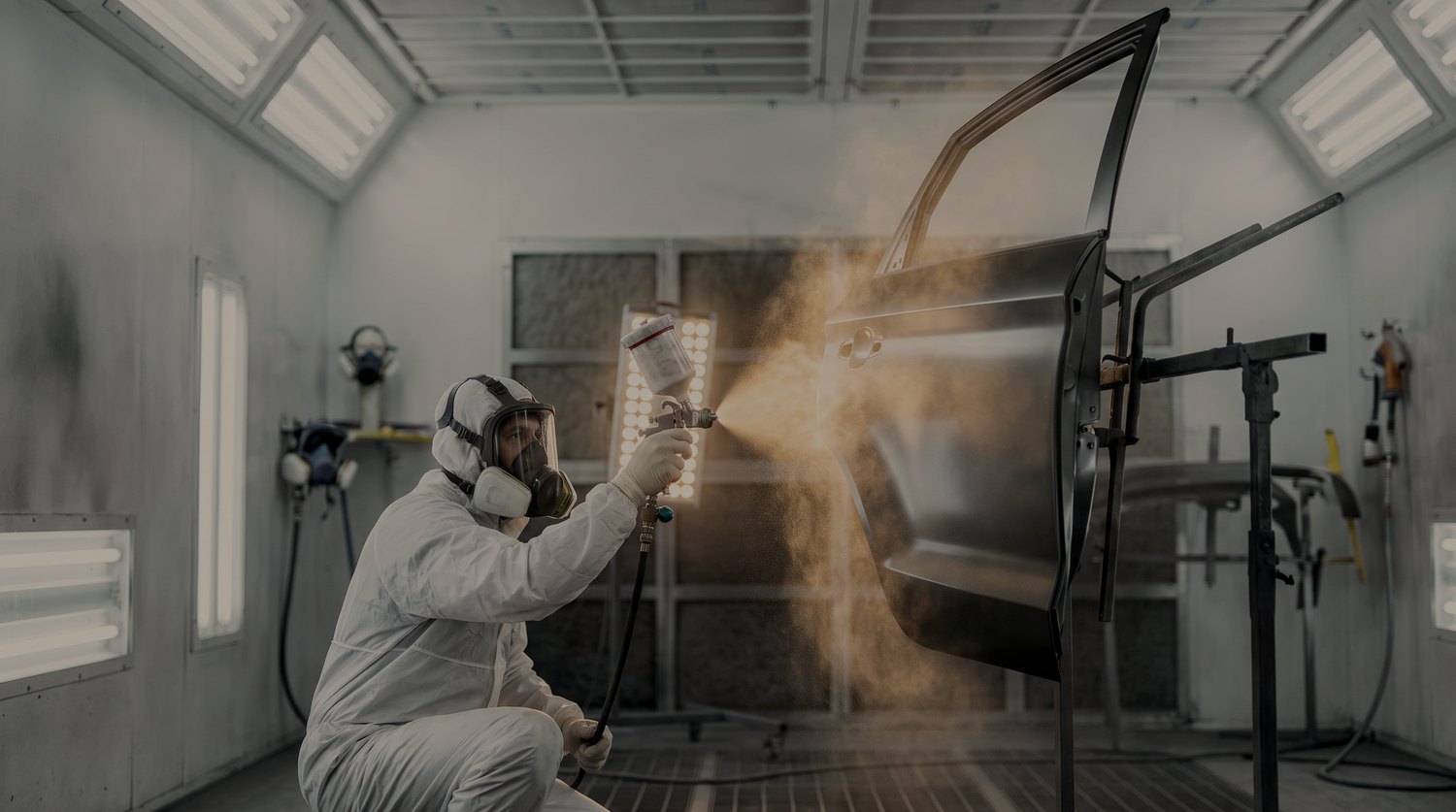 Refinishing a panel in a sealed paint booth